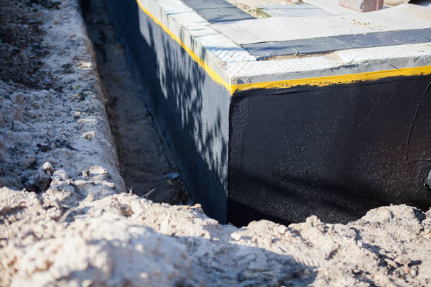 Professional Waterproofing technician working in Angelica, NY